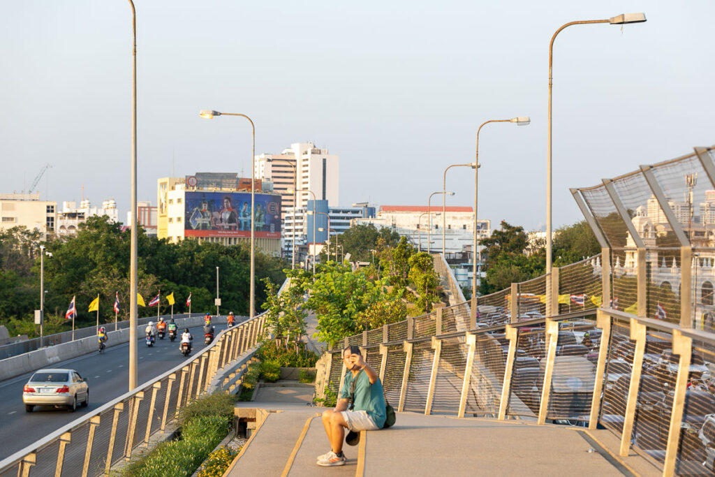 Man sits at Chao Phraya Sky Park